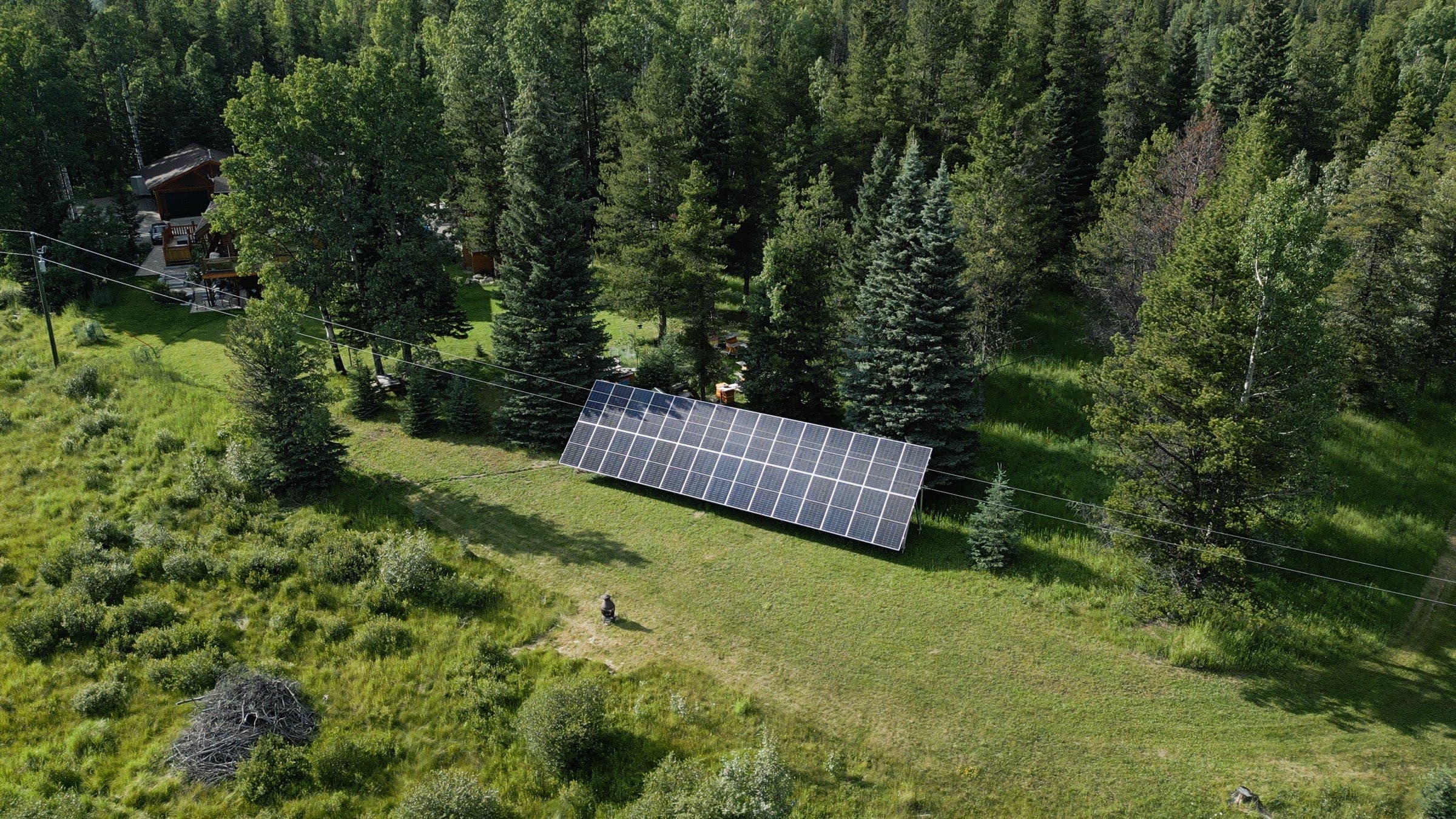 A 40 kW ground-mount solar array in a field in Rocky View County, from the air